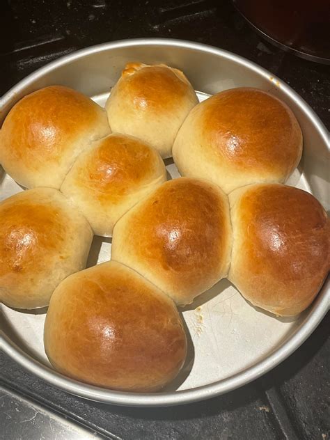 japanese milk bread rolls in a pan slightly too large so they didn t all grow together still