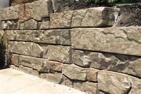 Strike sharply onto the end of the chisel to split the block into two pieces. Verti-Block Retaining Walls - Verti-Crete