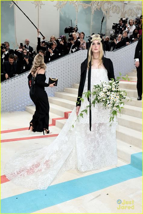 elle fanning wears a daisy crown in honor of karl lagerfled at the met gala 2023 photo 1375555