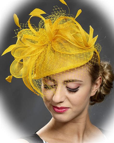 yellow trendy fascinator hat for the weddings races parties on the headband last available