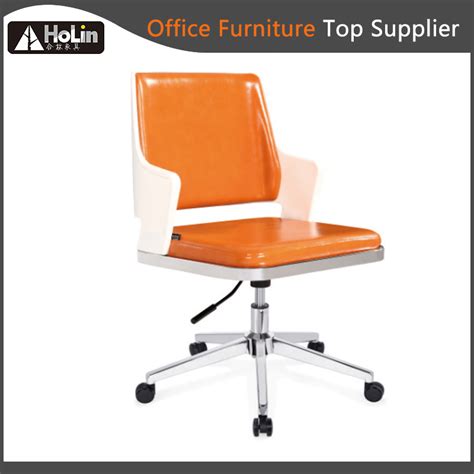 In this day and age where long hours of work at desks. China New Design Revolving Elevating PU Leather Ergonomic ...