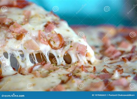 Hot Pizza Slice With Dripping Ham Sausage And Mozzarella Cheese Stock Image Image Of