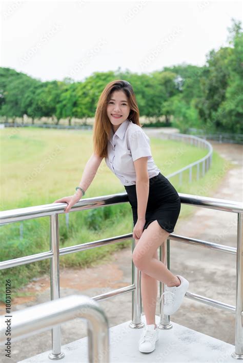 Portrait Of Beautiful Thai Studentcute Asian Girl Outdoorsthailand