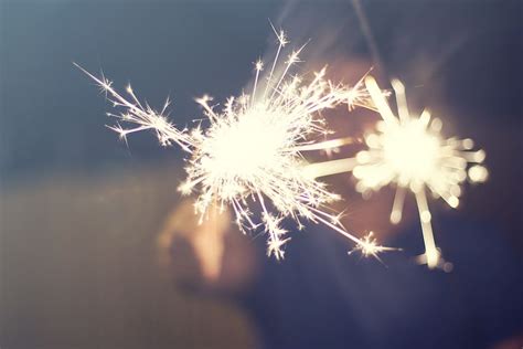 Hd Wallpaper Selective Focus Photo Of Person Holding Lighted Sparkler