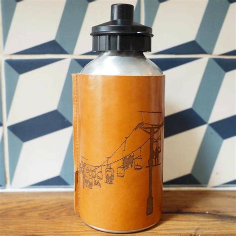 It is light and ergonomically designed with a simple carrying strap and is perfect for workouts at the gym. Skiing Personalised Leather Reusable Water Bottle By Stabo | notonthehighstreet.com