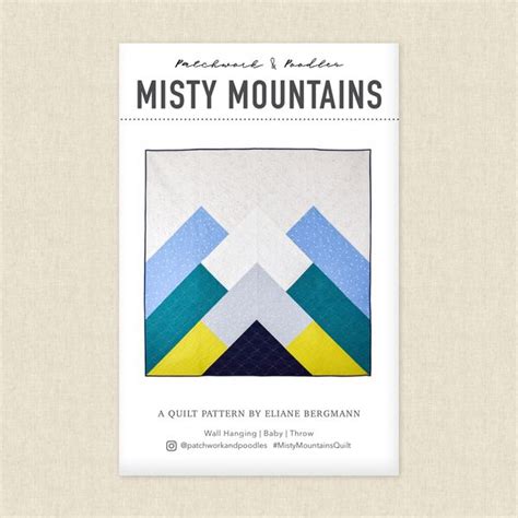 The Book Cover For Misty Mountains Featuring An Image Of Blue And