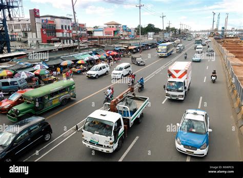 Traffic On Commonwealth Avenue Connecting Quezon City And Manila The