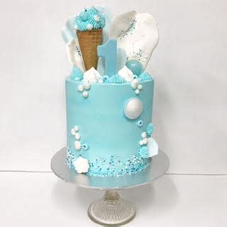 Return gift ideas for 1st birthday of your baby. Baby blue buttercream first birthday cake - Three Sweeties