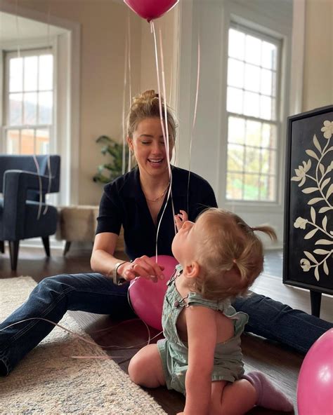 Amber Heard Looks Besotted In Adorable Photo With Rarely Seen Daughter