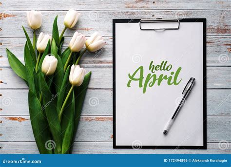 Greeting Card With The Inscription Hello April Bouquet Of White Tulip