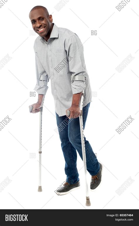 Man Walking Crutches Image And Photo Free Trial Bigstock