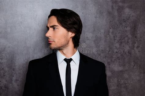 Side View Photo Of Stylish Young Man In Formalwear With Stubble Stock