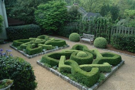 The lines of the pattern were created by planting some form of low, clipped hedge and the spaces in between were filled with colourful plants or coloured gravel, sand or crushed bricks. Garden Glory : Buzz | LuxeCrush.com | Parterre garden, Garden layout, Backyard garden layout