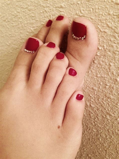 deep red toes with little rhinestones on the big toes red wedding nails red acrylic nails