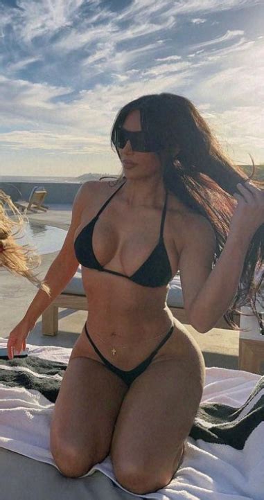 who made kim kardashian s black bikini and sunglasses outfitid
