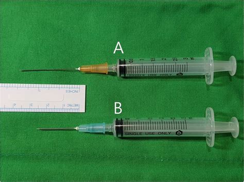 Fine Needle Aspiration Syringes Attached To 25 Gauge A And 23 Gauge