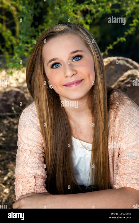 Portrait Of A Beautiful Blue Eyed Teenage Girl With Long Blond Stock