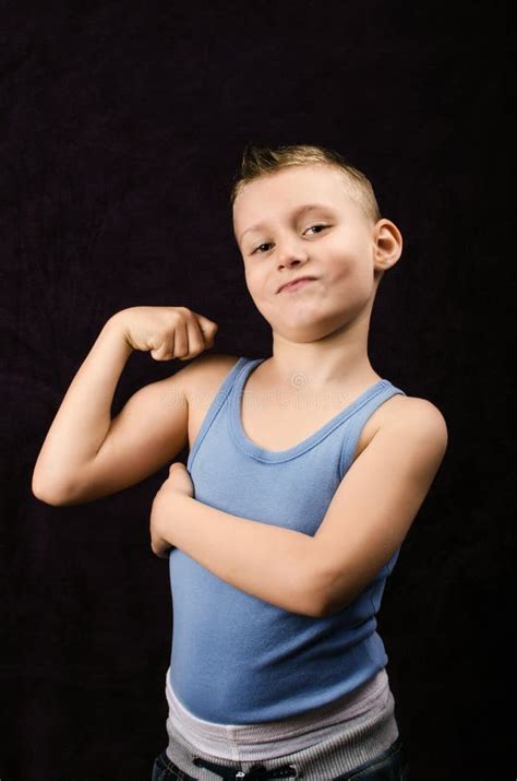 Little Boy Flexing His Muscles Stock Photos Free And Royalty Free Stock