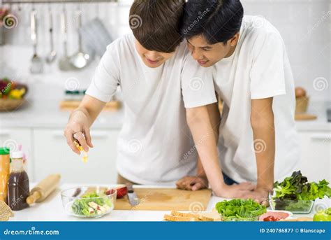 Asian Gay Couple Cook Salad Together In Kitchen Stock Image Image Of Dinner Caucasian 240786877