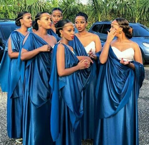 Bridesmaids In Blue Satin Rwandan Umushanana Traditional Attire With