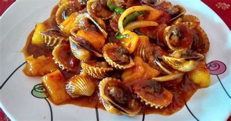 Wadah c berisi telur pitan dan kerang simping. Resep Kerang Asam Bagus Masak Pedas