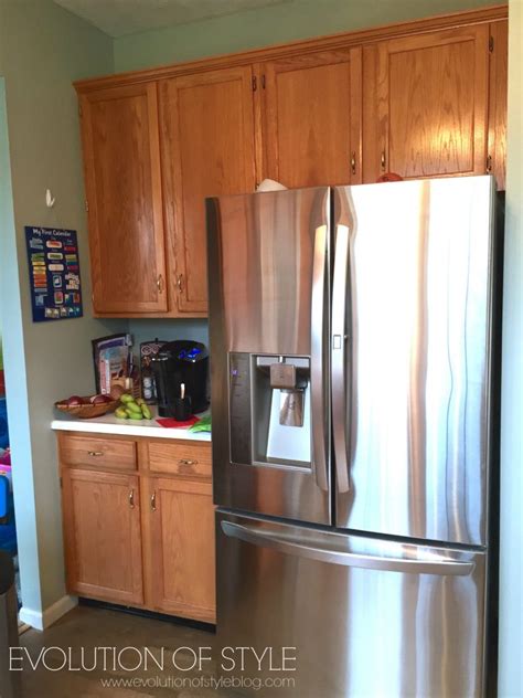 You always want to consider your furniture, decor and flooring before deciding on a paint color, as some furnishings and floors don't. A Revere Pewter Kitchen Cabinet Makeover - Evolution of Style