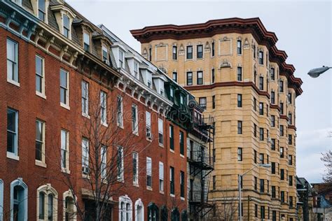 Row Houses And A Historic Highrise Building In Mount Vernon Baltimore