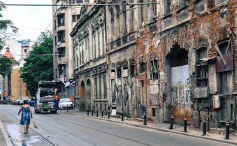 The Crumbling Beauty Of Bucharest Romania Just A Pack Bucharest