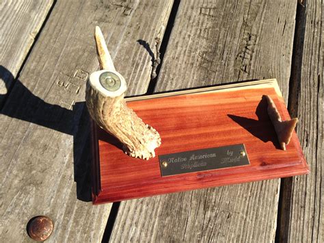 Courtship may involve paired flights. Custom knife display stand with a white tail deer antler ...