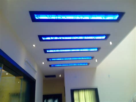 Follow us for a daily dose of outstanding homes, intelligent architecture & beautiful design. Ceiling design for a Lobby area with blue cove lights ...