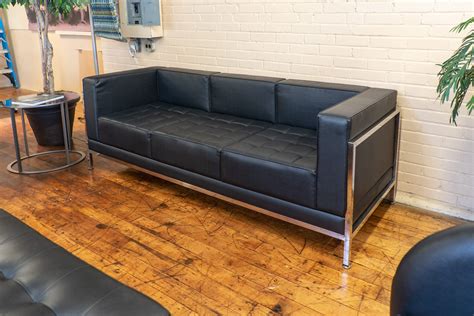 Mid Century Modern Black Leather Sofa • Peartree Office Furniture