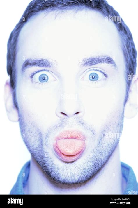 Man Sticking Out Tongue Close Up Portrait Stock Photo Alamy