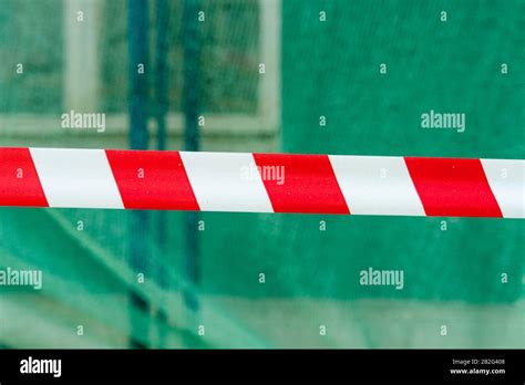 Do Not Cross Red White Line On Green Background Stock Photo Alamy