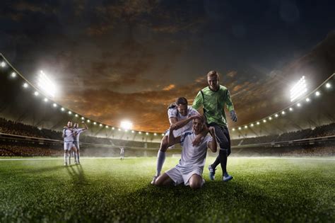 Soccer Players In Action On Sunset Stadium Background Panorama The