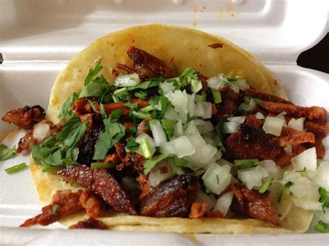 Tacos al pastor are tacos filled with grilled pork that has been marinated in fresh pineapple juice, dried chiles, onions, a little orange juice and some classic mexican spices. #38 - AL PASTOR TACOS at TACO MIX | Eat This NY