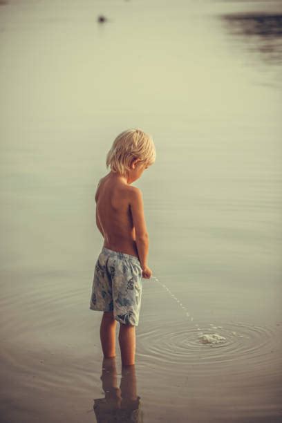 Boys Peeing Outside Stock Photos Pictures And Royalty Free Images Istock