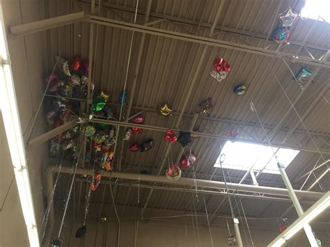 These Balloons Hopelessly Trapped On The Ceiling Of The Local 1 Store