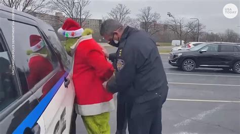 Grinch Tries To Steal Christmas Presents At Illinois Charity Event