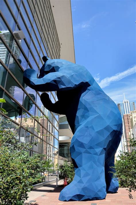 Big Blue Bear Sculpture Peering Into Convention Center In Denver