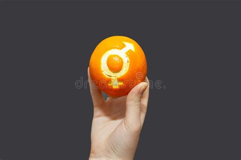 Gender Equality Orange With The Sign Of Gender Equality In The Hand Of