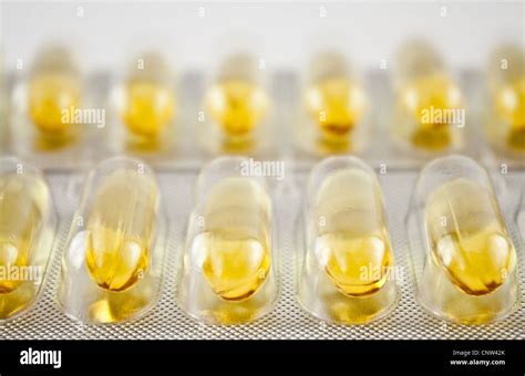 Yellow Gel Pills In A Blister Stock Photo Alamy