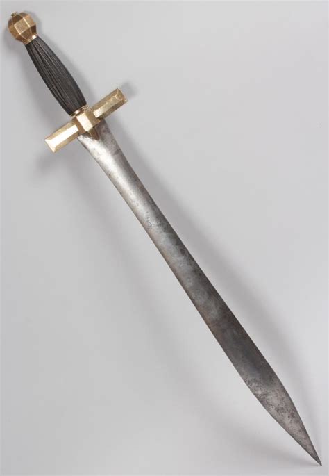 A Copy Of A Roman Type Sword Hilt With Brass Octagonal Pomm
