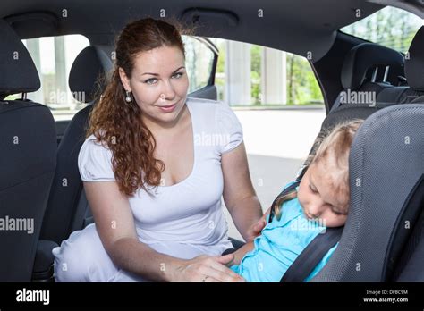 Mom daughter car seat hi-res stock photography and images - Alamy