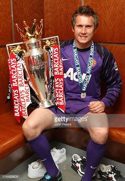 Tomasz Kuszczak Of Manchester United Poses In The Dressing Room With