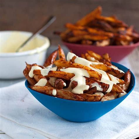 Baked Spicy Fries With Garlic Cheese Sauce Recipe Pinch Of Yum