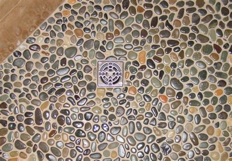 In the fixture and fittings any pros or cons to installing black pebble tile as the if possible you may want to exaggerate the slope of the shower a wee bit to prevent this problem with. Pin by Sallie on Gabions | Stone shower floor, Pebble ...