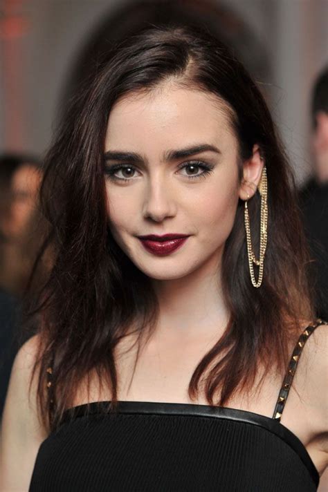 famous actress lily collins from mirror mirror movies aka famous male singer phil collins s