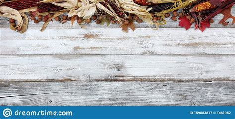 Top Border Of Autumn Decorations On White Rustic Wooden Boards For The