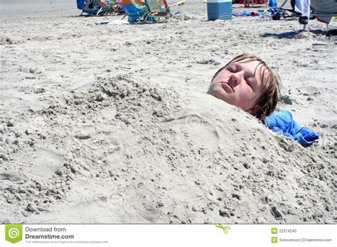 Teen Boy Buried In Sand Stock Photo Image 22314240