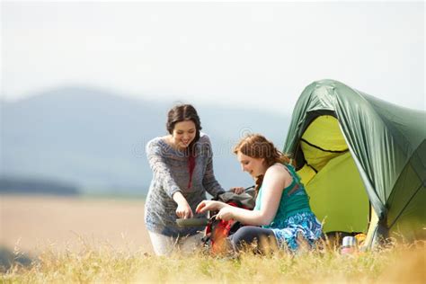 Two Teenage Girls On Camping Trip In Countryside Stock Image Image Of